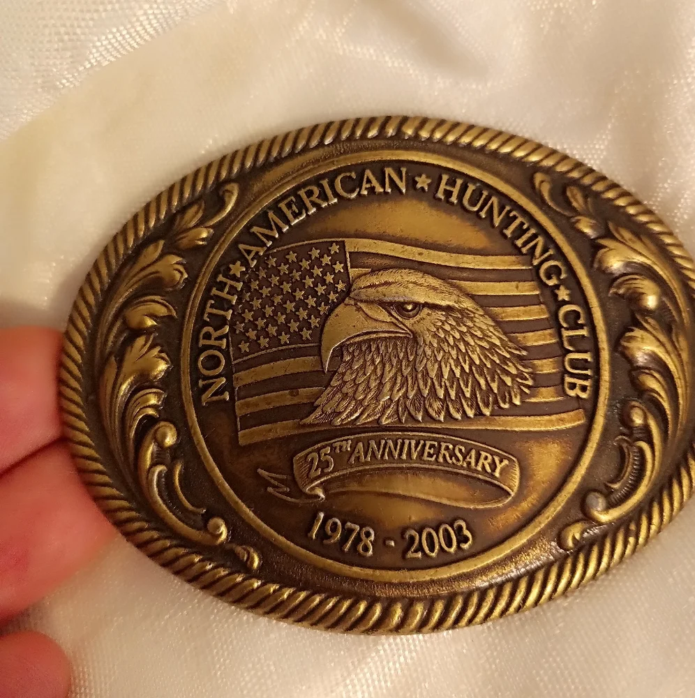 North American Hunting Club 25th anniversary western brass belt buckle